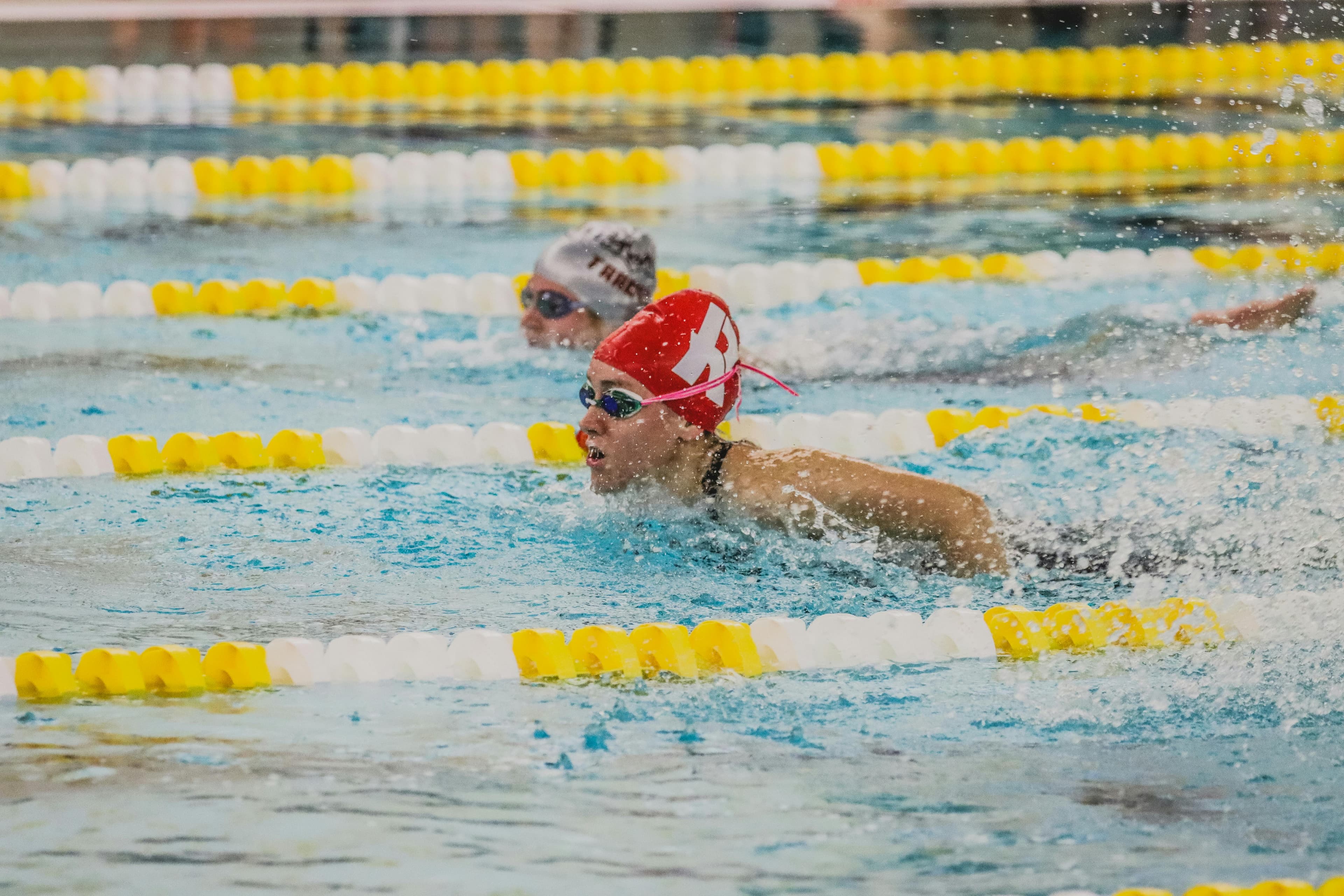 Swimmers racing